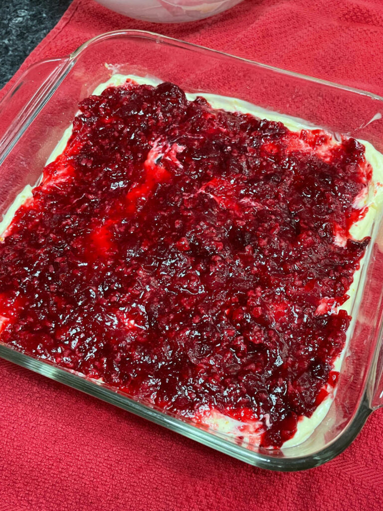 Keto Cranberry Cheesecake Bars cranberry sauce layer