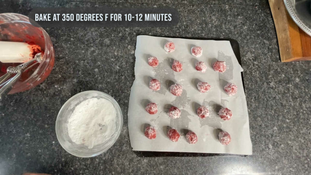 Keto Red Velvet Crinkle Cookies cookie dough balls coated with monk fruit