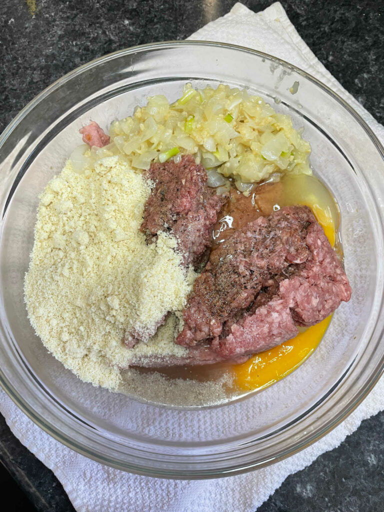 Keto Beef and Turkey Meatloaf ingredients in a bowl