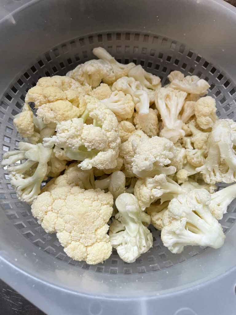 Roasted Cauliflower rinse in colander