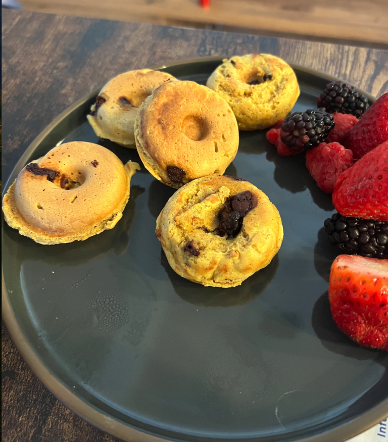 vegan keto donuts on a plate with fruit